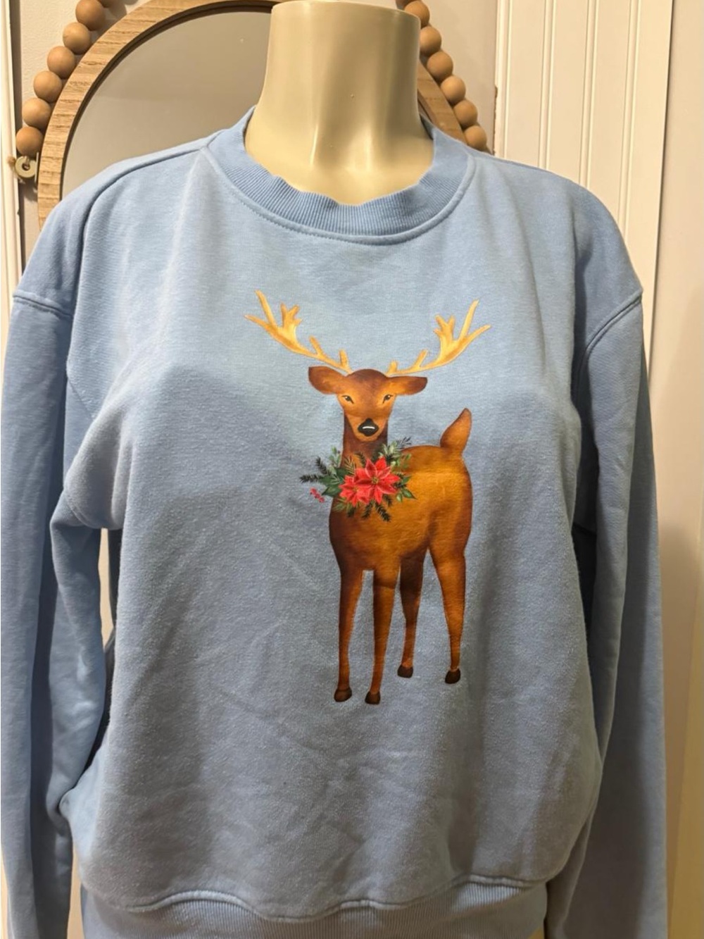 Light Blue Crewneck Sweater with Festive Deer Motif
